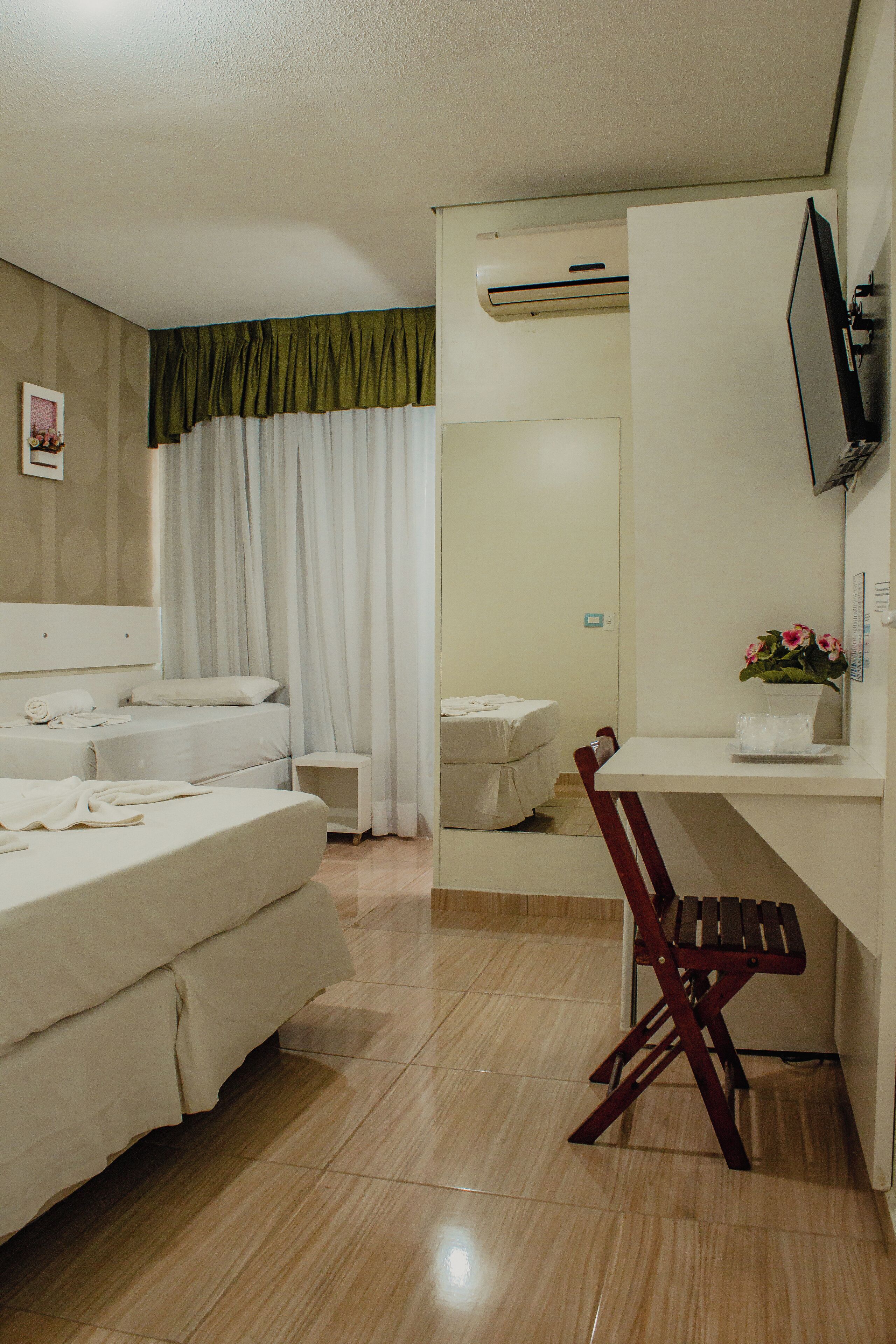 Triple Room | Minibar, in-room safe, desk, blackout drapes