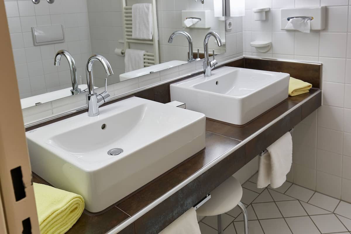 superior double room | bathroom | shower, free toiletries, hair dryer, towels