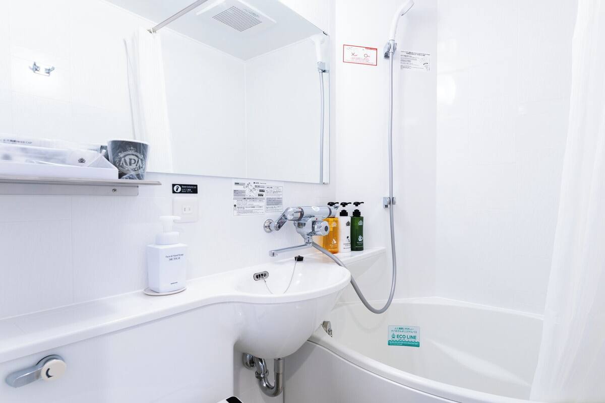 Separate tub and shower, deep soaking tub, free toiletries, slippers