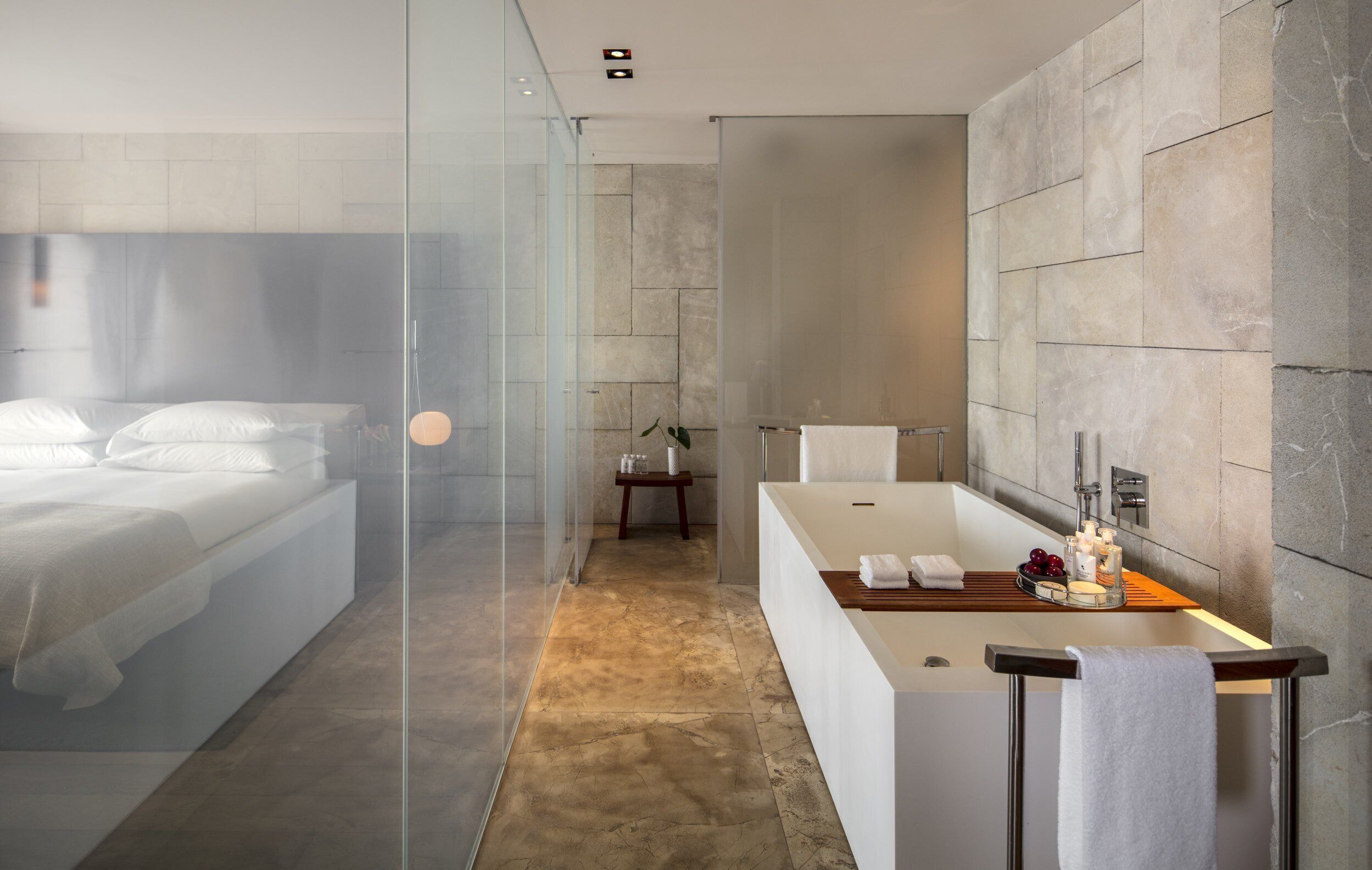 presidential suite (conjoined beds) | bathroom | separate bathtub and shower, deep-soaking bathtub, rainfall showerhead