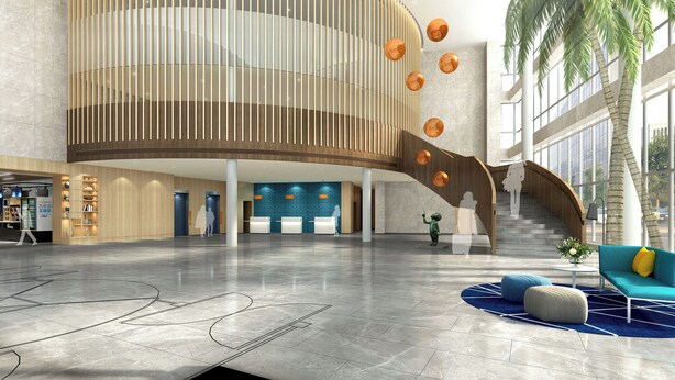A spacious lobby with a curved wooden reception desk, a child playing, and a blue sofa with a yellow pillow. - Holiday Inn Express Tianjin Dongli by IHG (Tianjin)