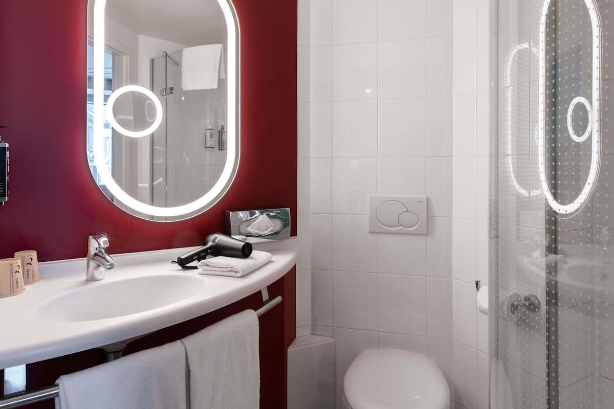 Shower, eco-friendly toiletries, hair dryer, towels