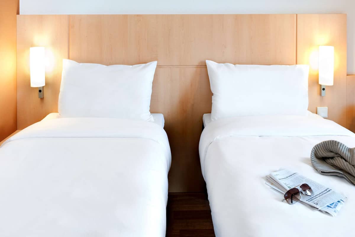 standard twin room, 2 single beds | down duvets, in-room safe, desk, laptop workspace