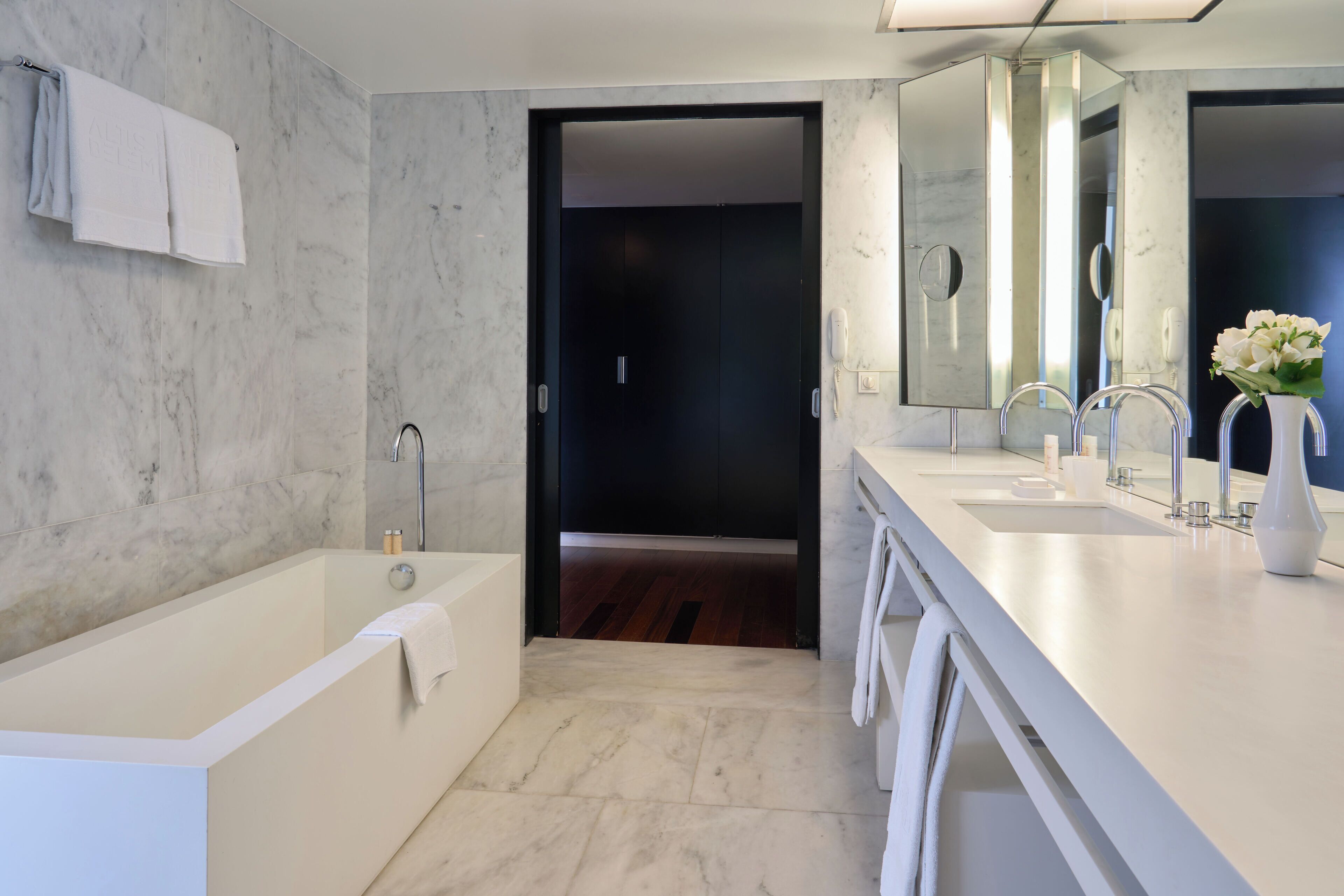 executive suite | bathroom | hair dryer, bathrobes, slippers, towels