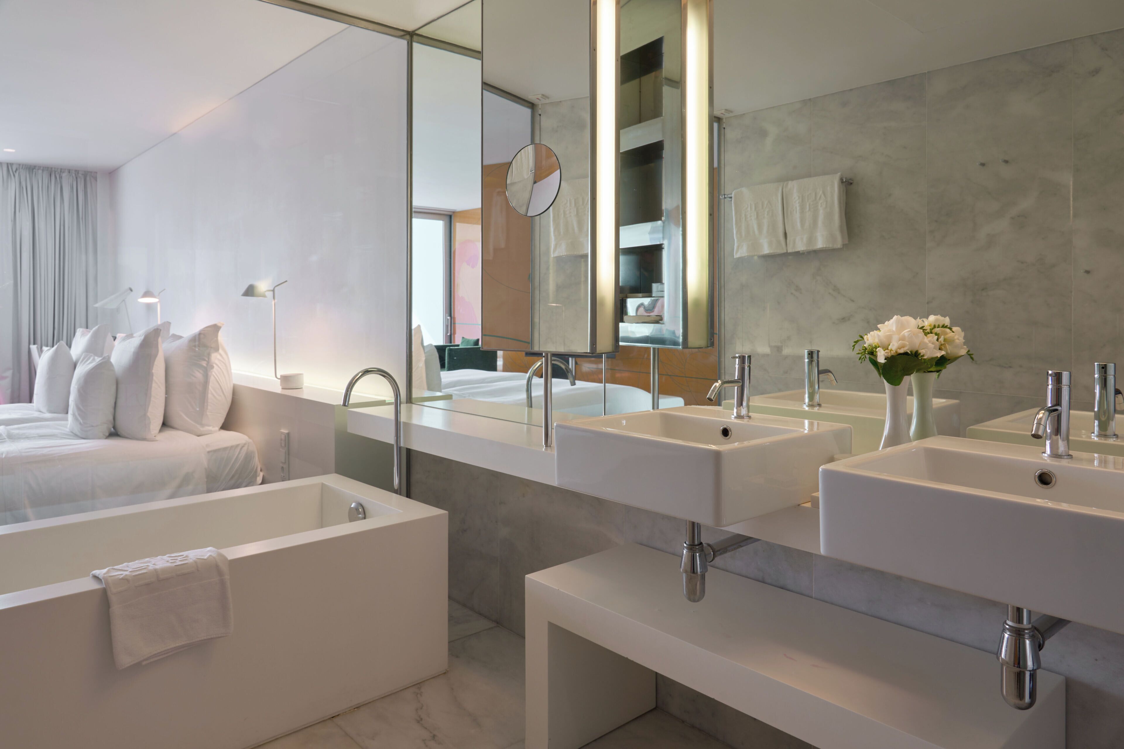 hair dryer, bathrobes, slippers, towels