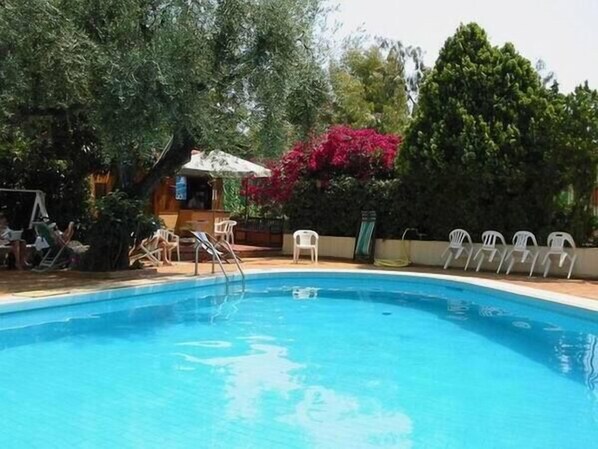 Outdoor pool, pool umbrellas, pool loungers