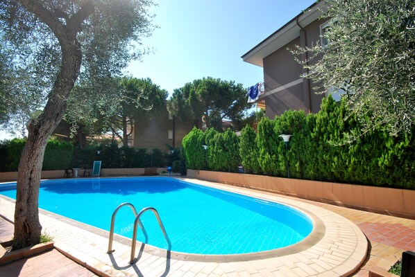 Outdoor pool, pool umbrellas, pool loungers