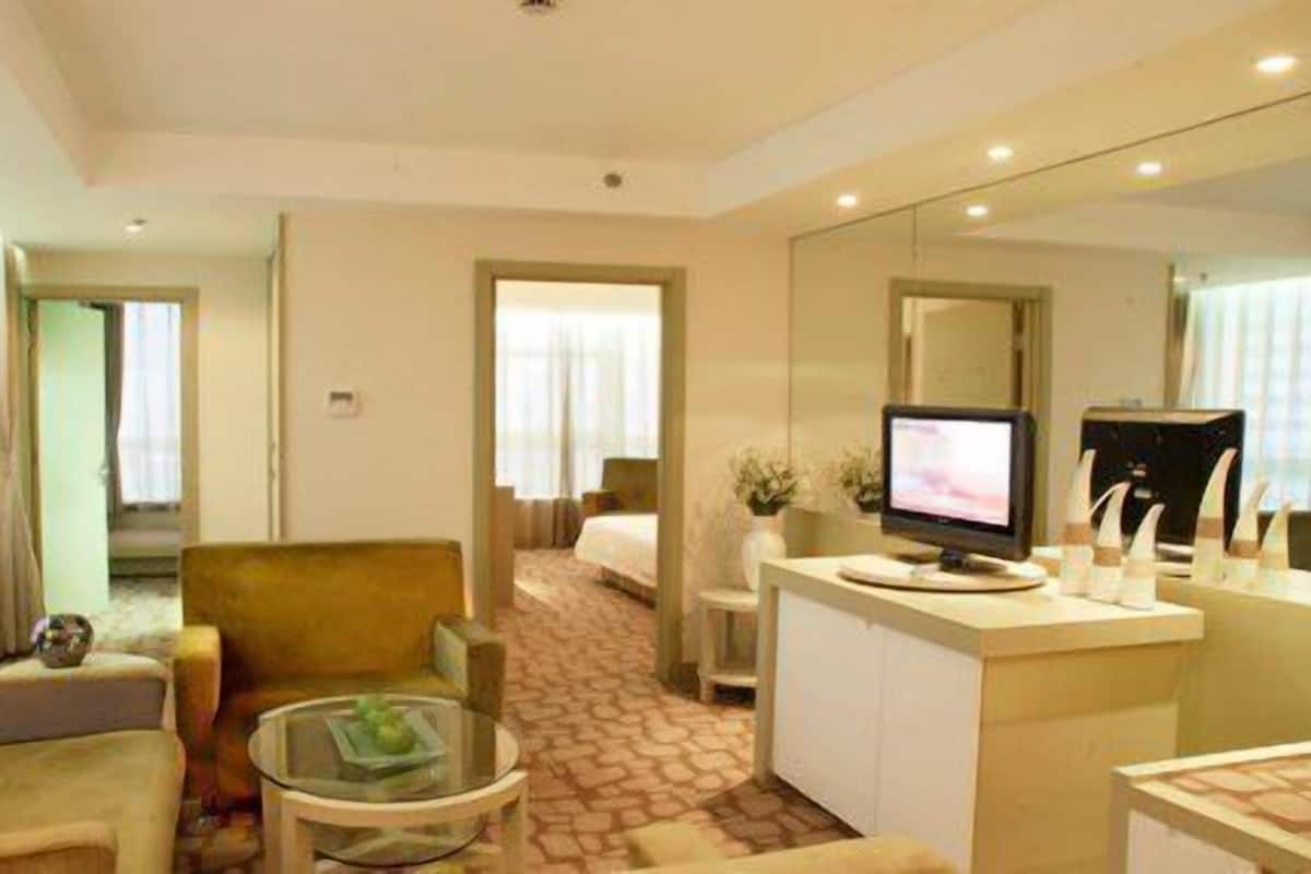 Executive Suite, 1 King Bed | Living area | LCD TV