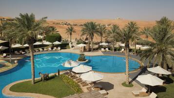 Outdoor pool, pool umbrellas, pool loungers