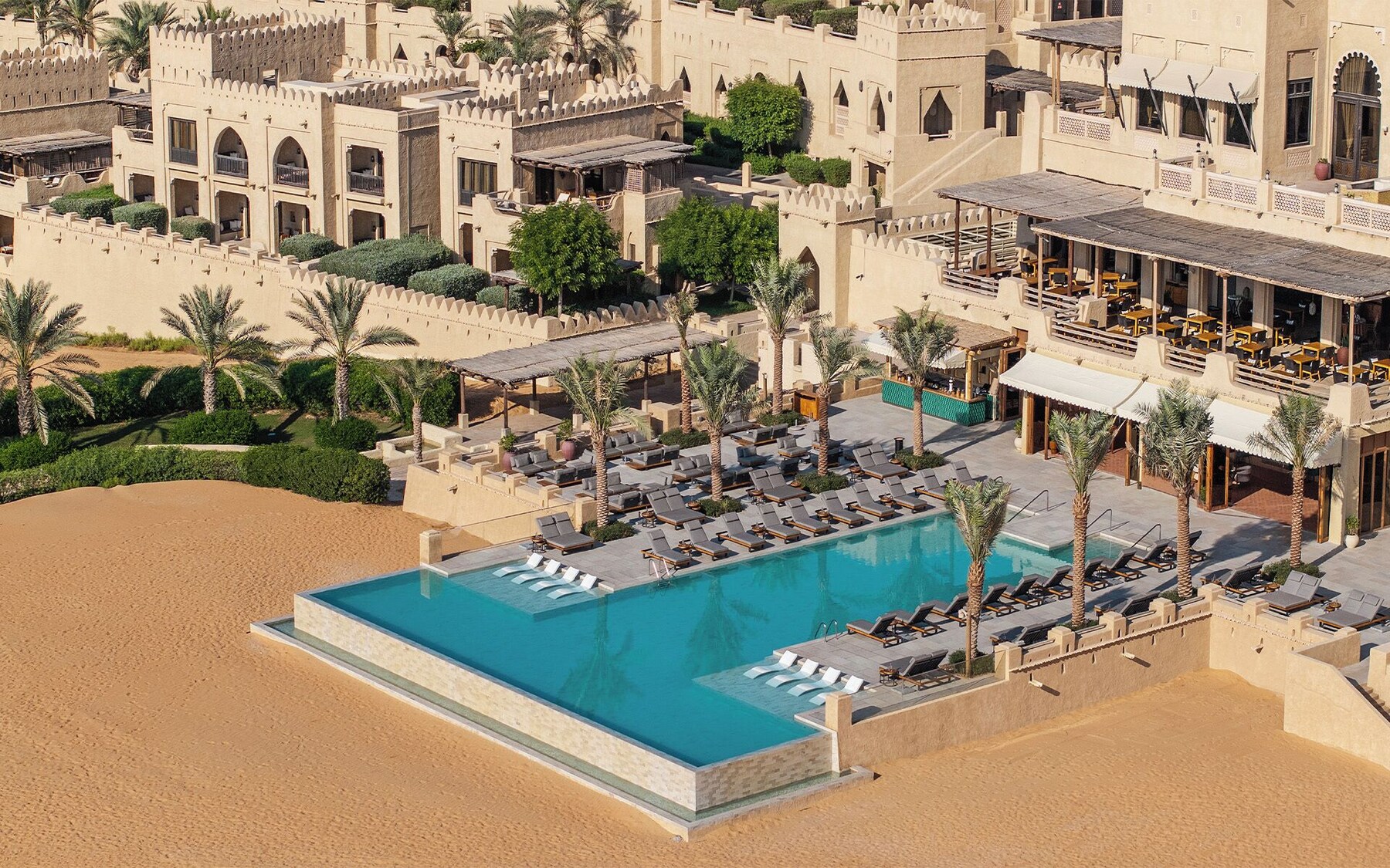 Outdoor pool, pool umbrellas, pool loungers