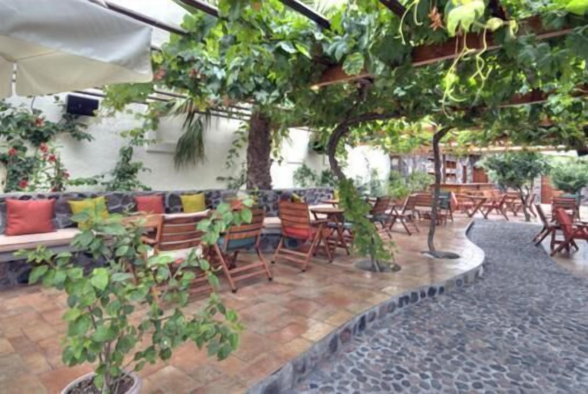 breakfast, lunch, dinner served; mediterranean cuisine, garden views