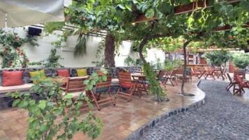 Breakfast, lunch, dinner served; Mediterranean cuisine, garden views