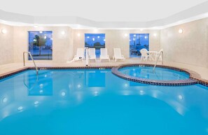 Indoor pool, open 7:00 AM to 10:00 PM, sun loungers