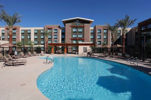 Outdoor pool, open 8:00 AM to 10:00 PM, pool umbrellas, sun loungers