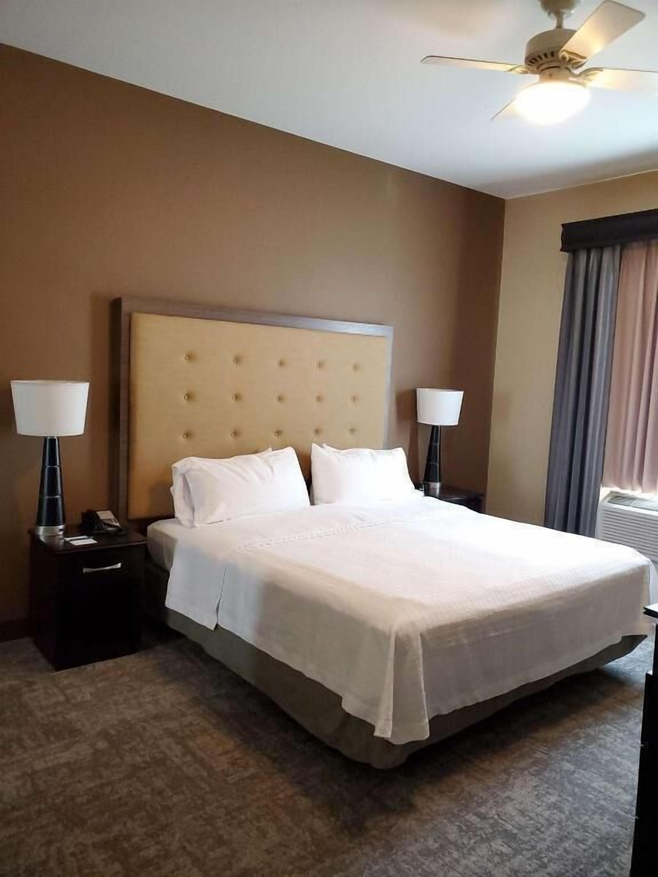 Premium bedding, individually furnished, desk, laptop workspace