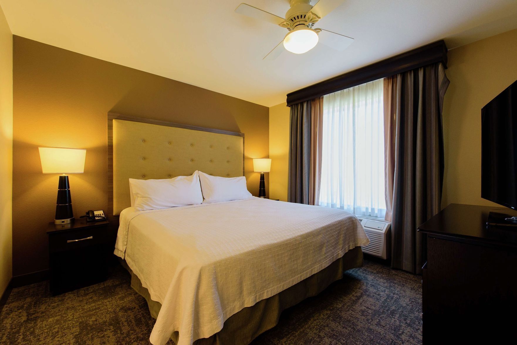 Premium bedding, individually furnished, desk, laptop workspace