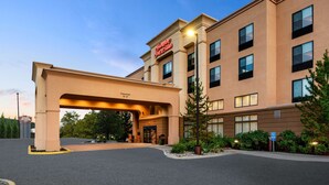 A Hampton Inn & Suites with a clear entrance, a parking lot, and a well-maintained exterior. - Hampton Inn & Suites Fairbanks (Fairbanks)