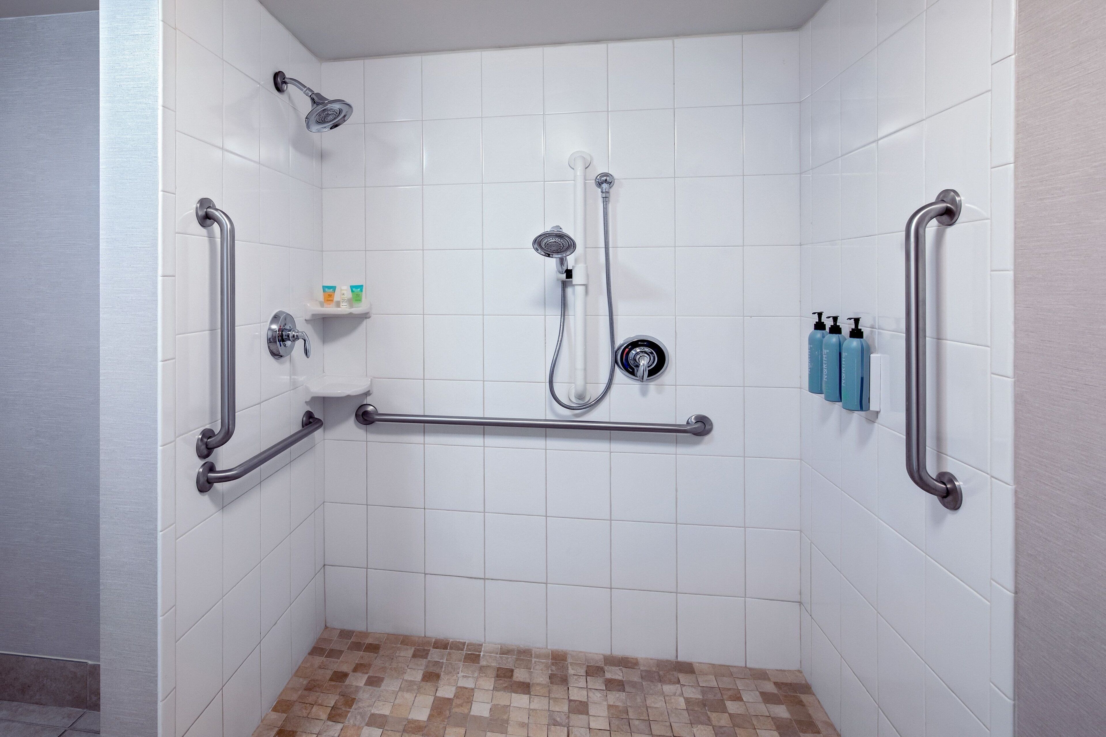 combined shower/bathtub, free toiletries, hair dryer, towels