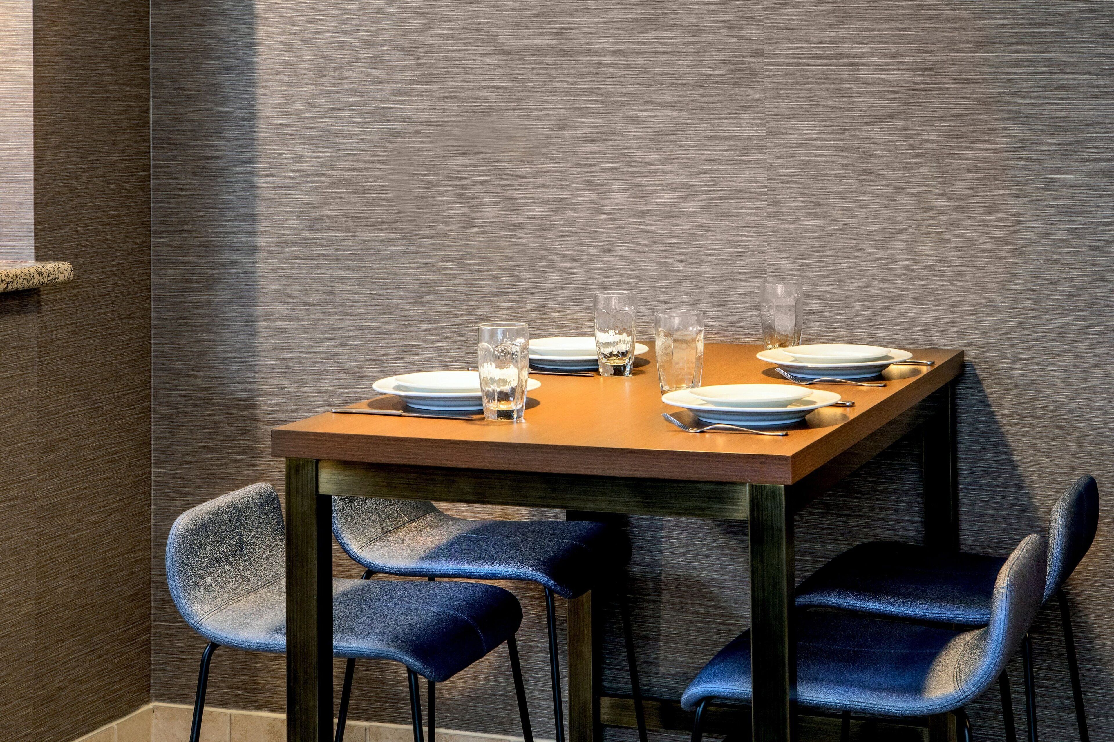 premium bedding, pillow-top beds, desk, laptop workspace