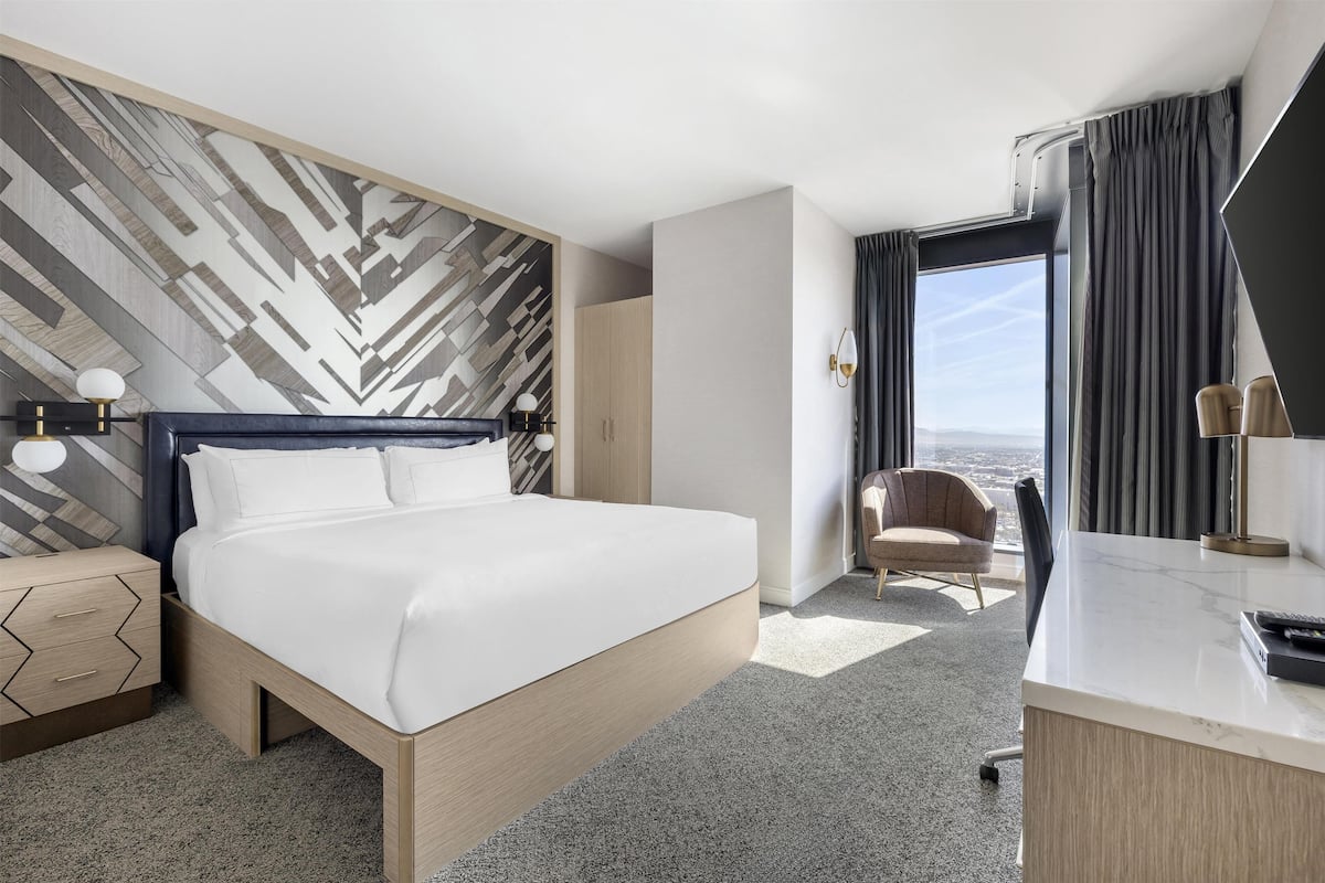 Premium bedding, down comforters, pillowtop beds, in-room safe