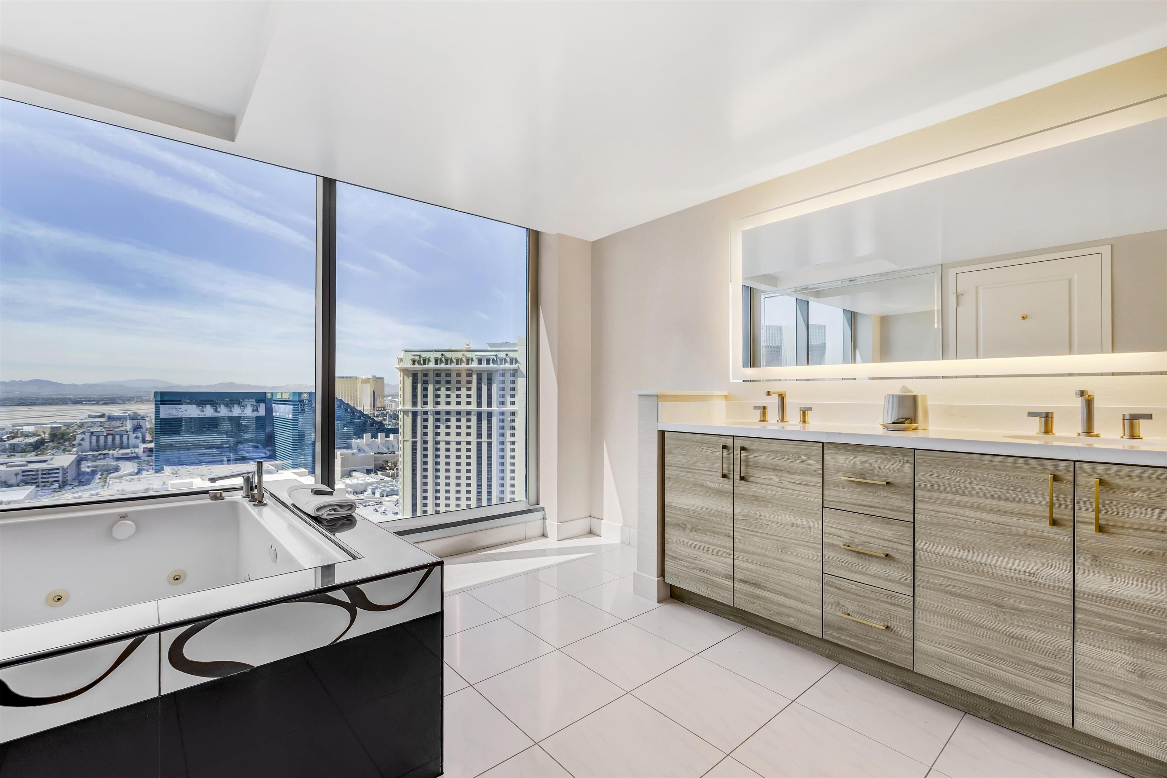 designer toiletries, hair dryer, towels