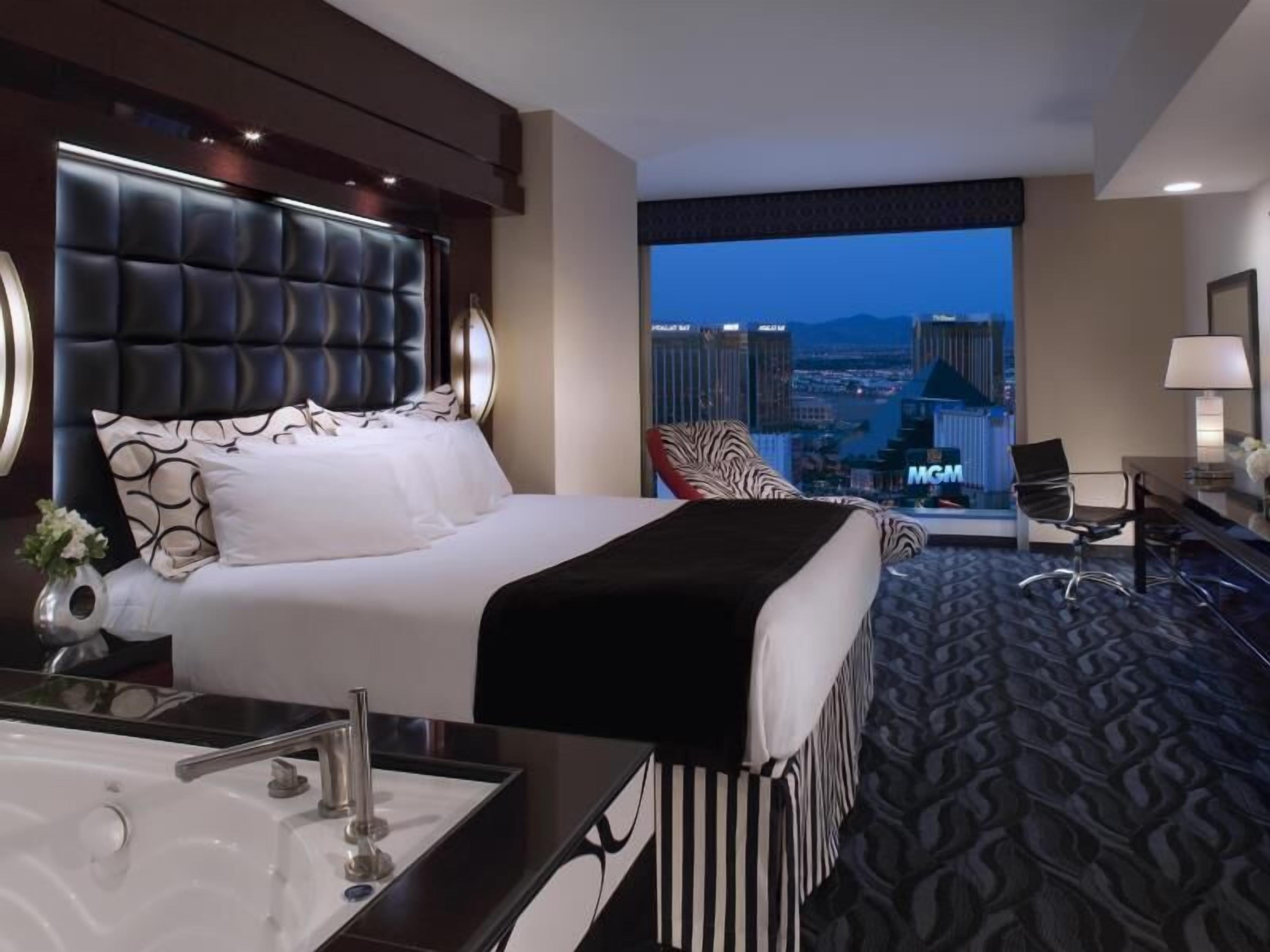 Premium bedding, down duvets, pillow-top beds, in-room safe