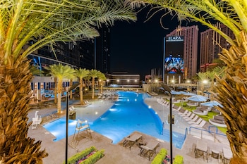 Seasonal outdoor pool, open 8:00 AM to 8:30 PM, cabanas (surcharge) at Hilton Grand Vacations Club Elara Center Strip Las Vegas