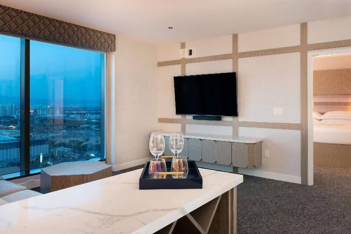 Premium bedding, down duvets, pillow-top beds, in-room safe