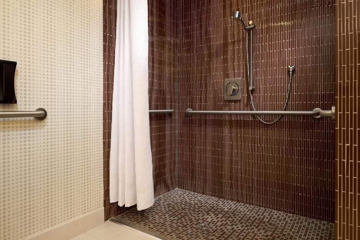 Bathroom | Designer toiletries, hair dryer, towels