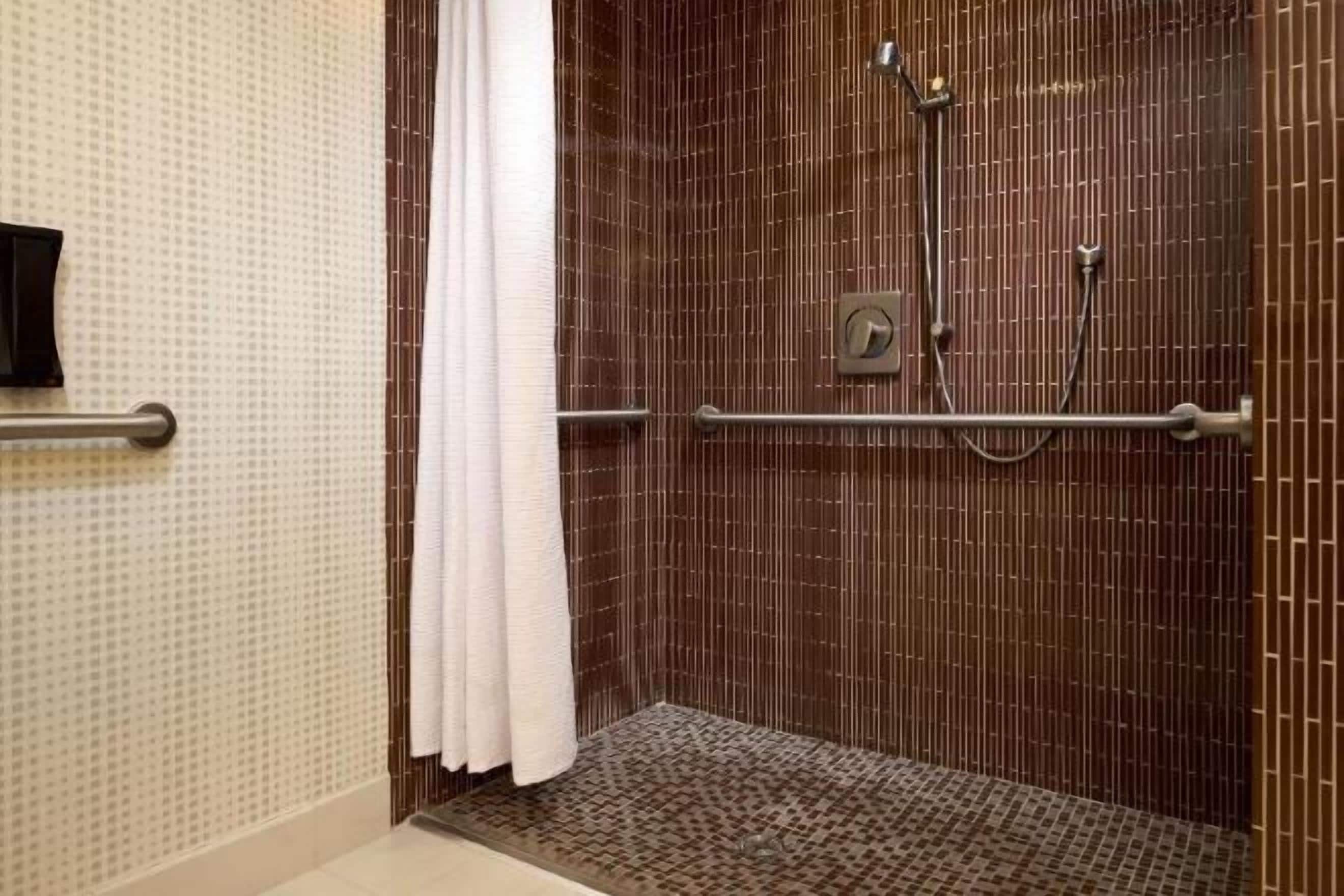 Bathroom | Designer toiletries, hair dryer, towels