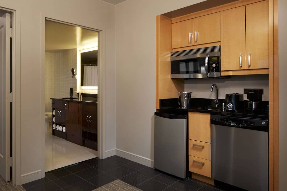 Premium bedding, down comforters, pillowtop beds, in-room safe