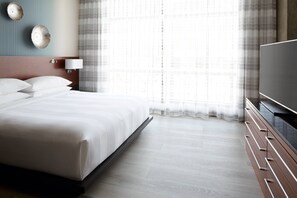 Premium bedding, down comforters, pillowtop beds, in-room safe