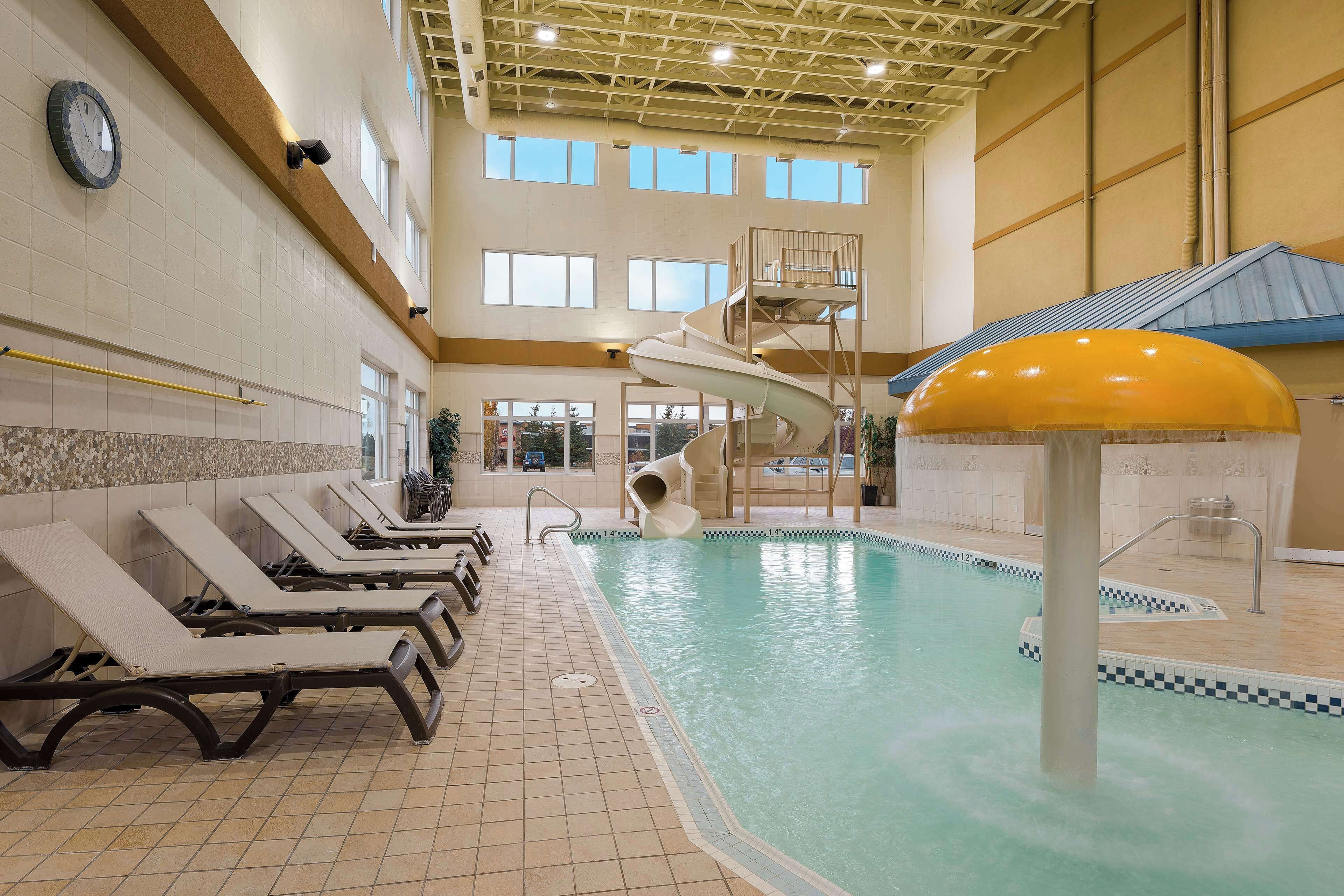 indoor pool, open 8:00 am to 10:00 pm, pool loungers