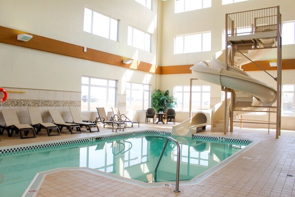 Indoor pool, open 8:00 AM to 10:00 PM, pool loungers