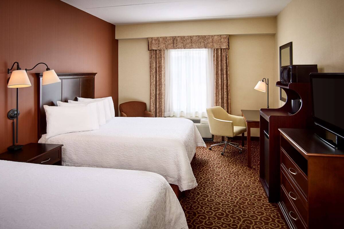 two queen beds non smoking | blackout curtains, iron/ironing board, free cots/infant beds, free wifi