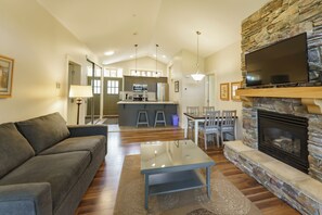 42-inch TV with cable channels, fireplace, pay films