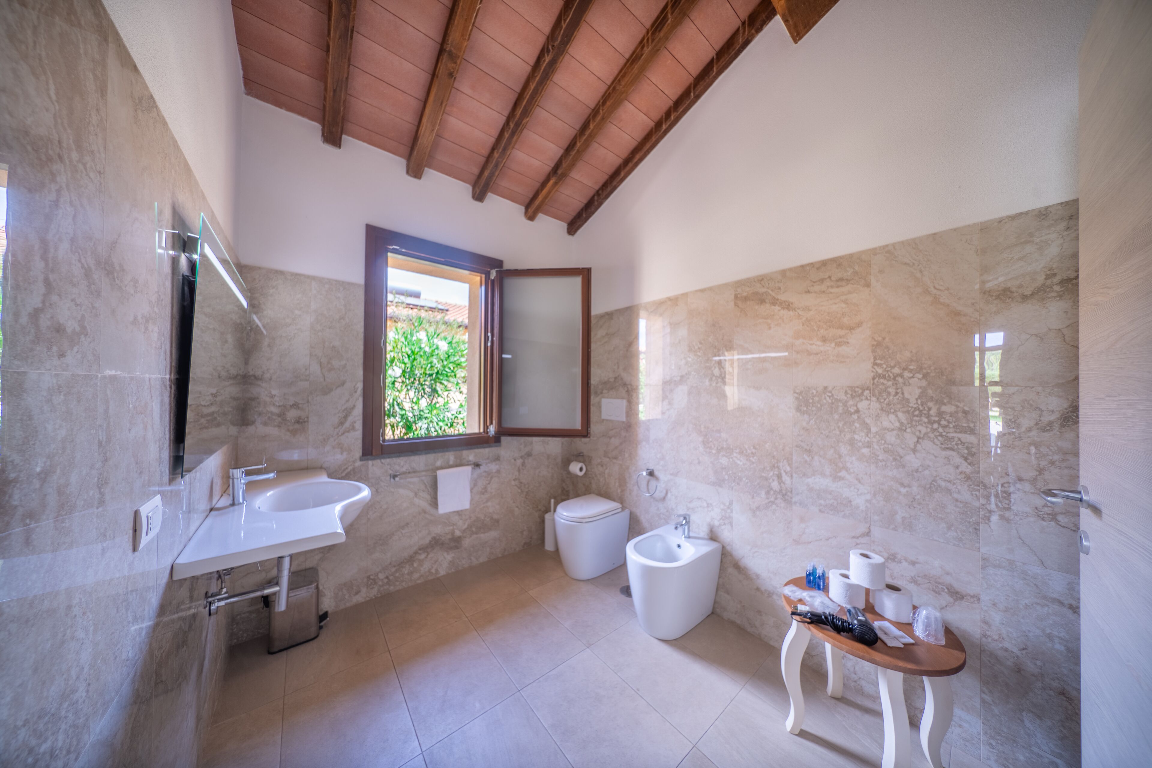 cottage club 1 | bathroom | rainfall showerhead, free toiletries, hair dryer, bidet