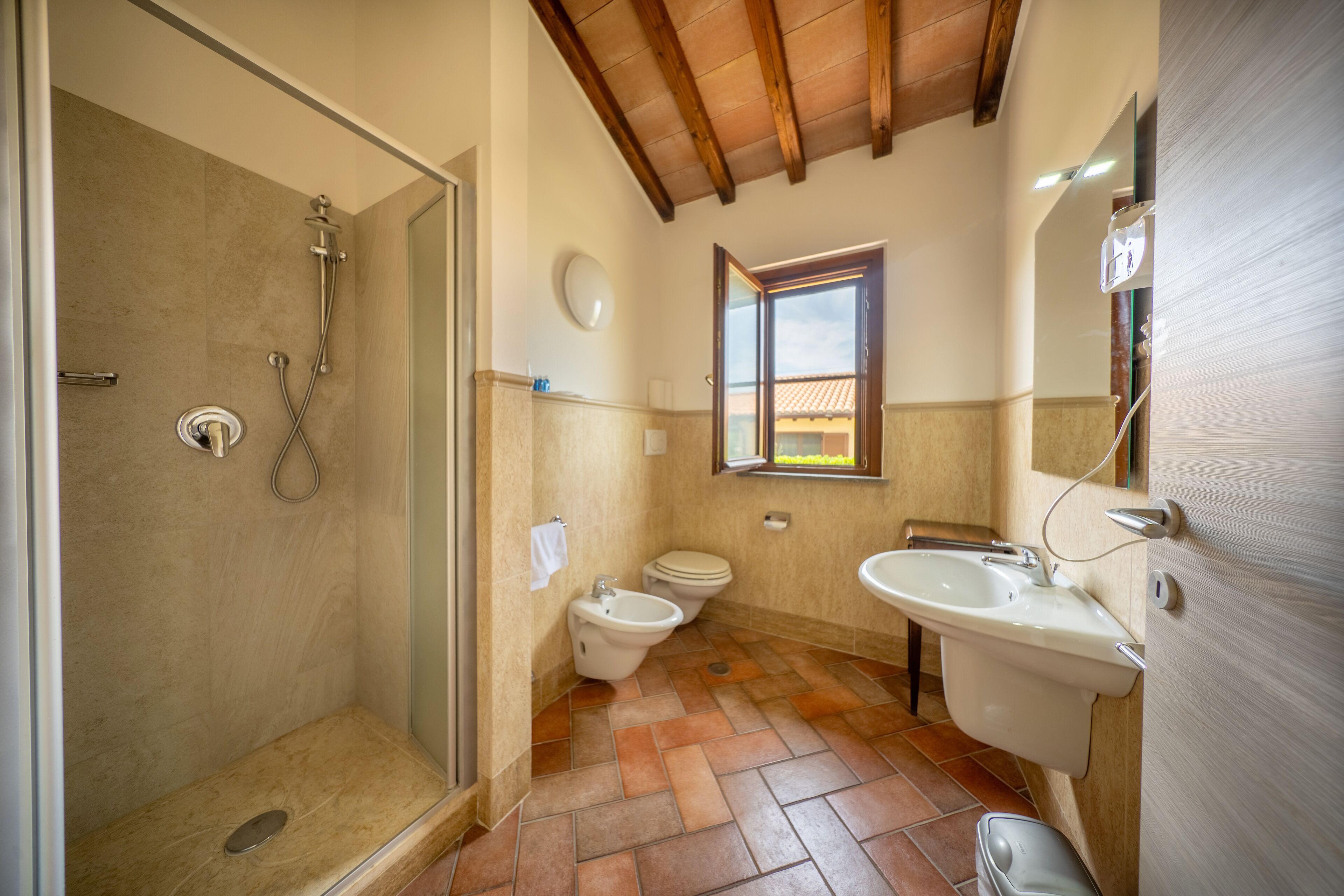 cottage club 2 | bathroom | rainfall showerhead, free toiletries, hair dryer, bidet