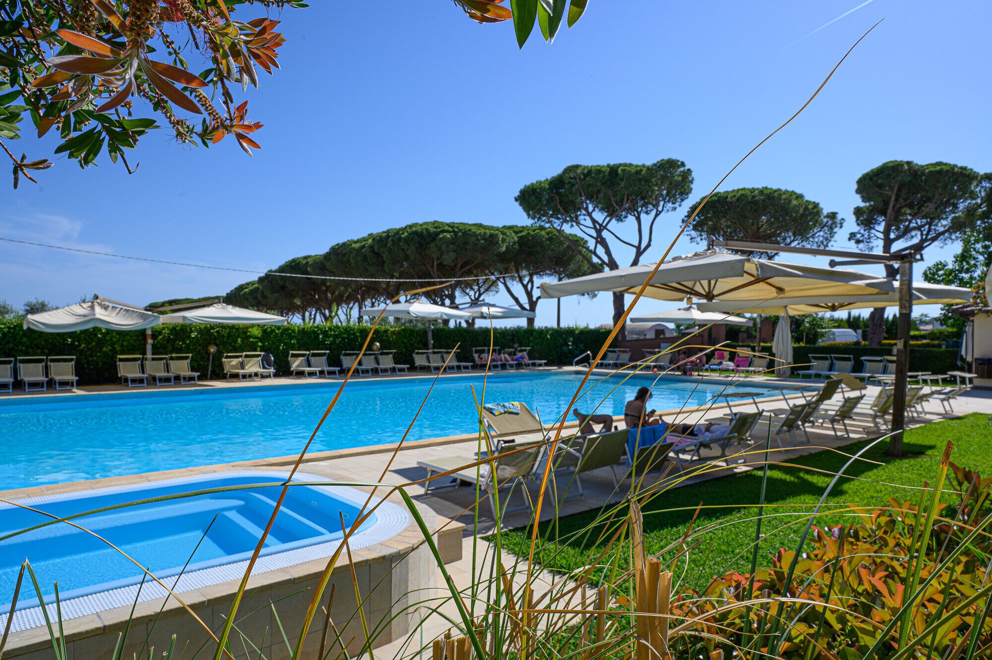 seasonal outdoor pool, open 9:30 am to 7:30 pm, pool umbrellas