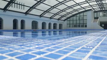 Indoor pool, open 8 AM to 8 PM, pool umbrellas, sun loungers