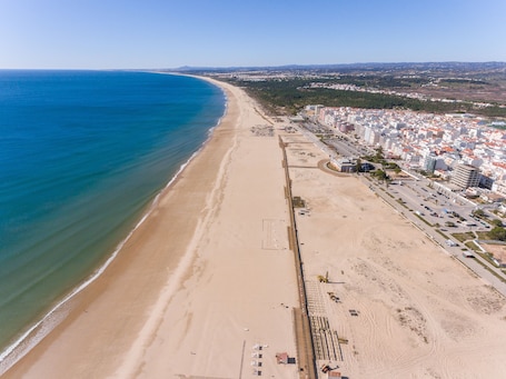 Beach nearby, sun loungers