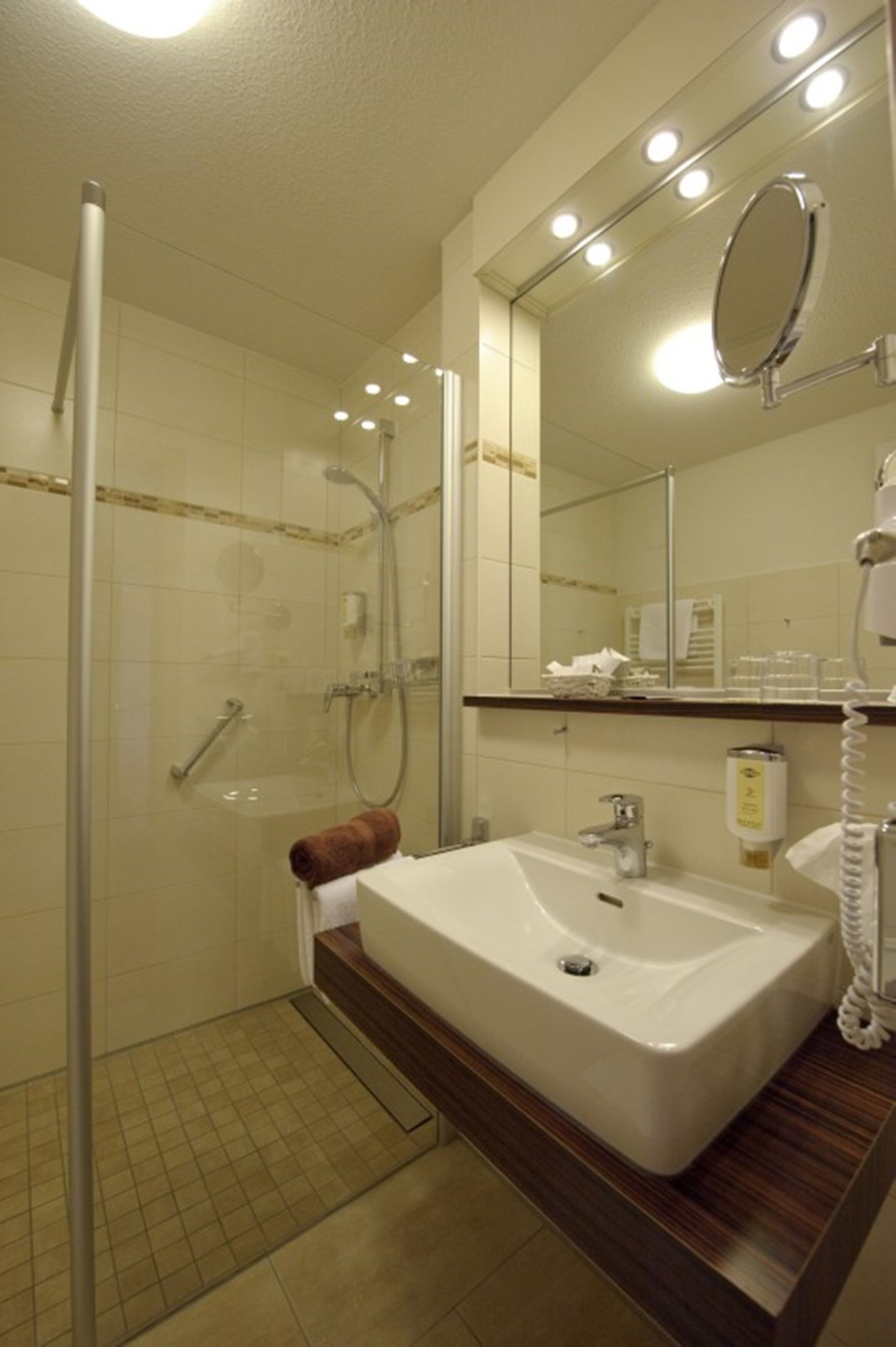 shower, free toiletries, hair dryer, bathrobes