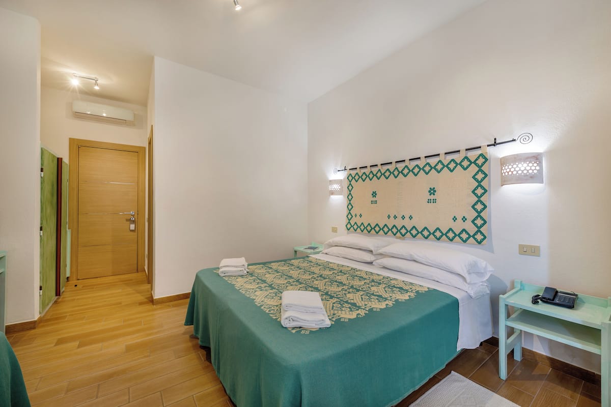 Memory-foam beds, minibar, in-room safe, desk