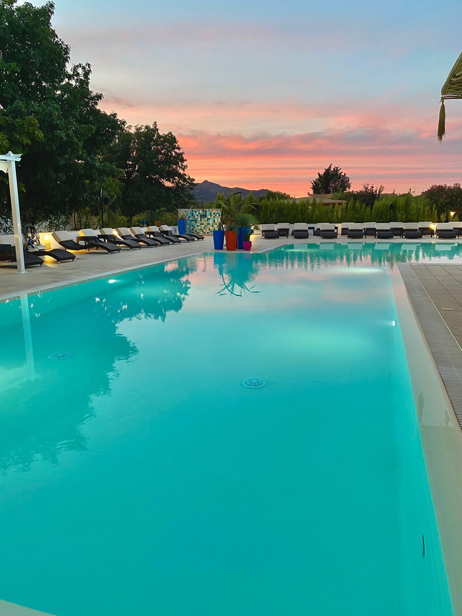 outdoor pool, open 10:30 am to 8:00 pm, pool loungers