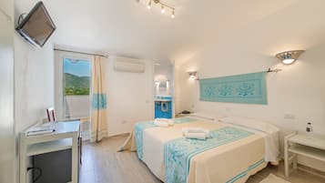 Memory-foam beds, minibar, in-room safe, desk