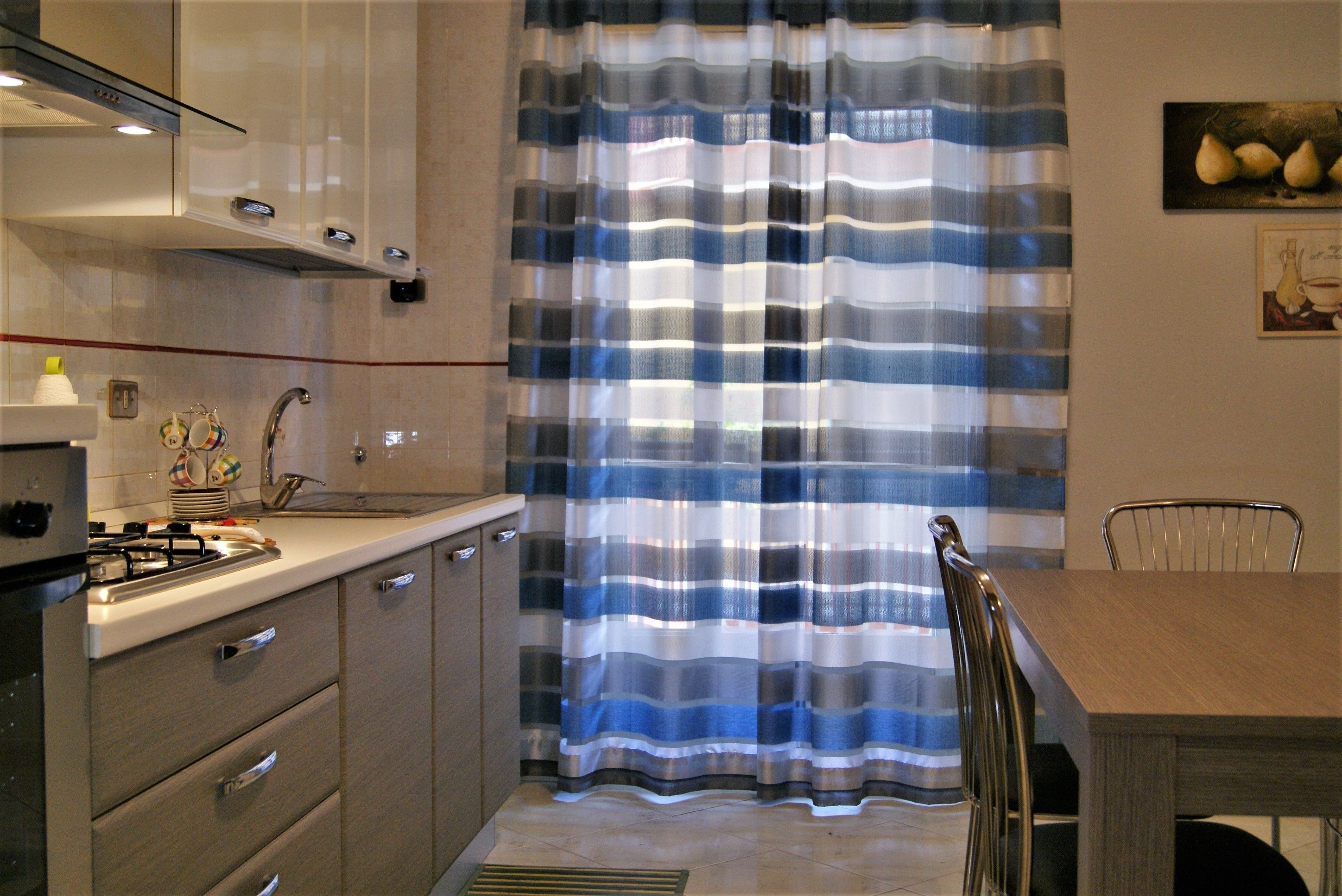 Appartement Confort, 2 chambres, balcon, vue ville | Cuisine privée | Plaque de cuisson, batterie de cuisine, vaisselle et ustensiles