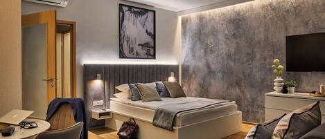 Deluxe Studio | In-room safe, individually decorated, blackout curtains