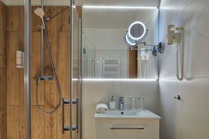 Hair dryer, towels, soap, shampoo