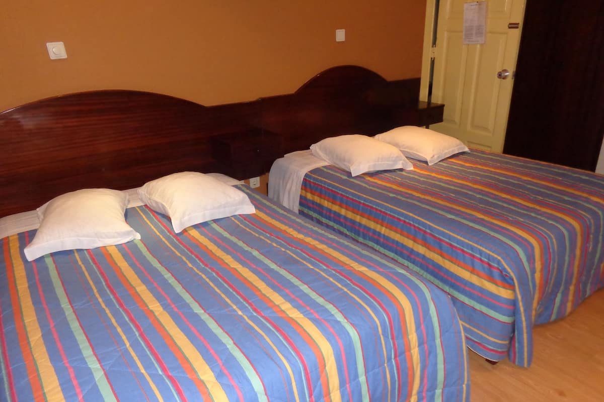 Desk, WiFi (free), bed sheets