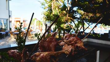 Breakfast, lunch, dinner served; pool views